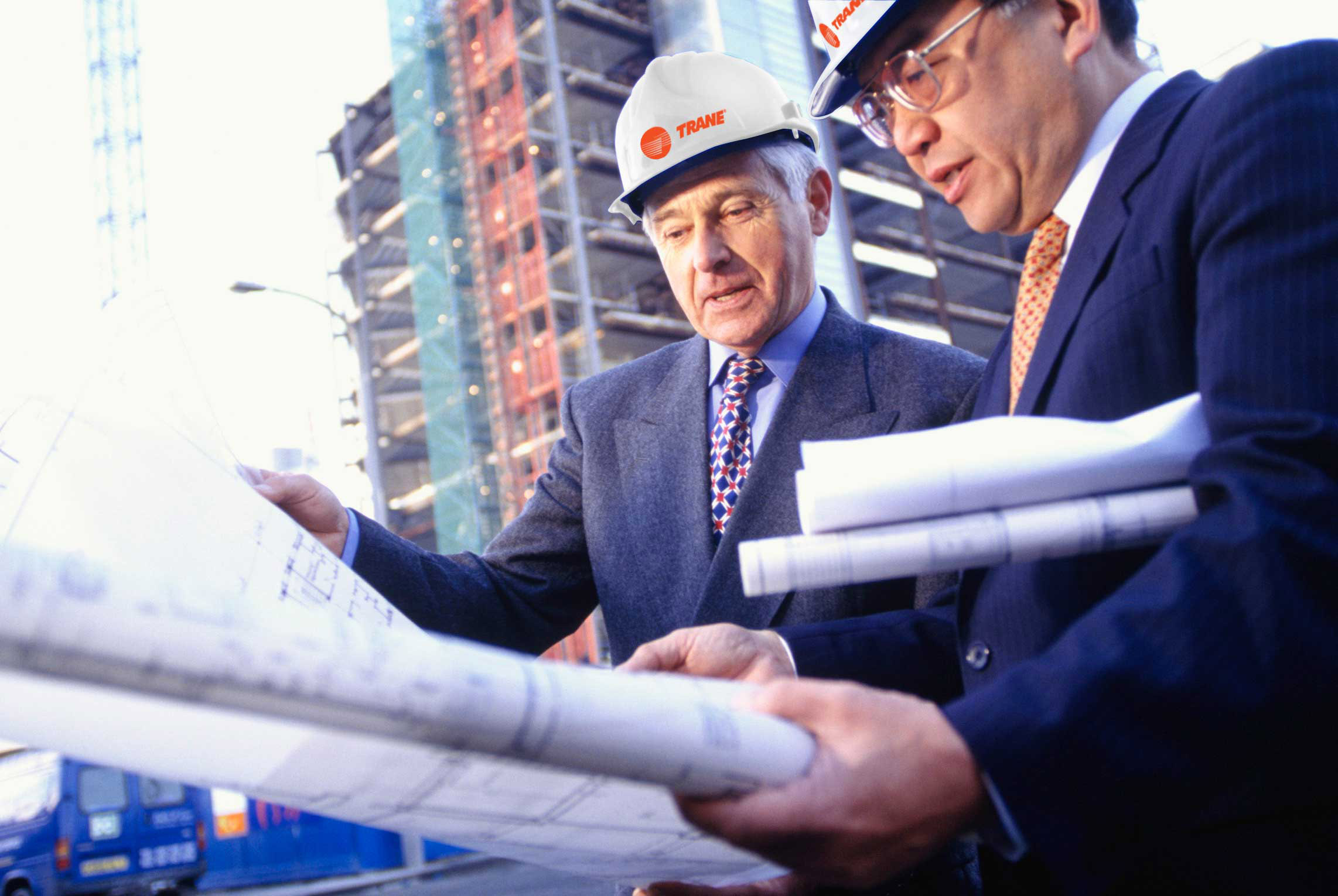 ACE engineers reviewing equipment drawings on site